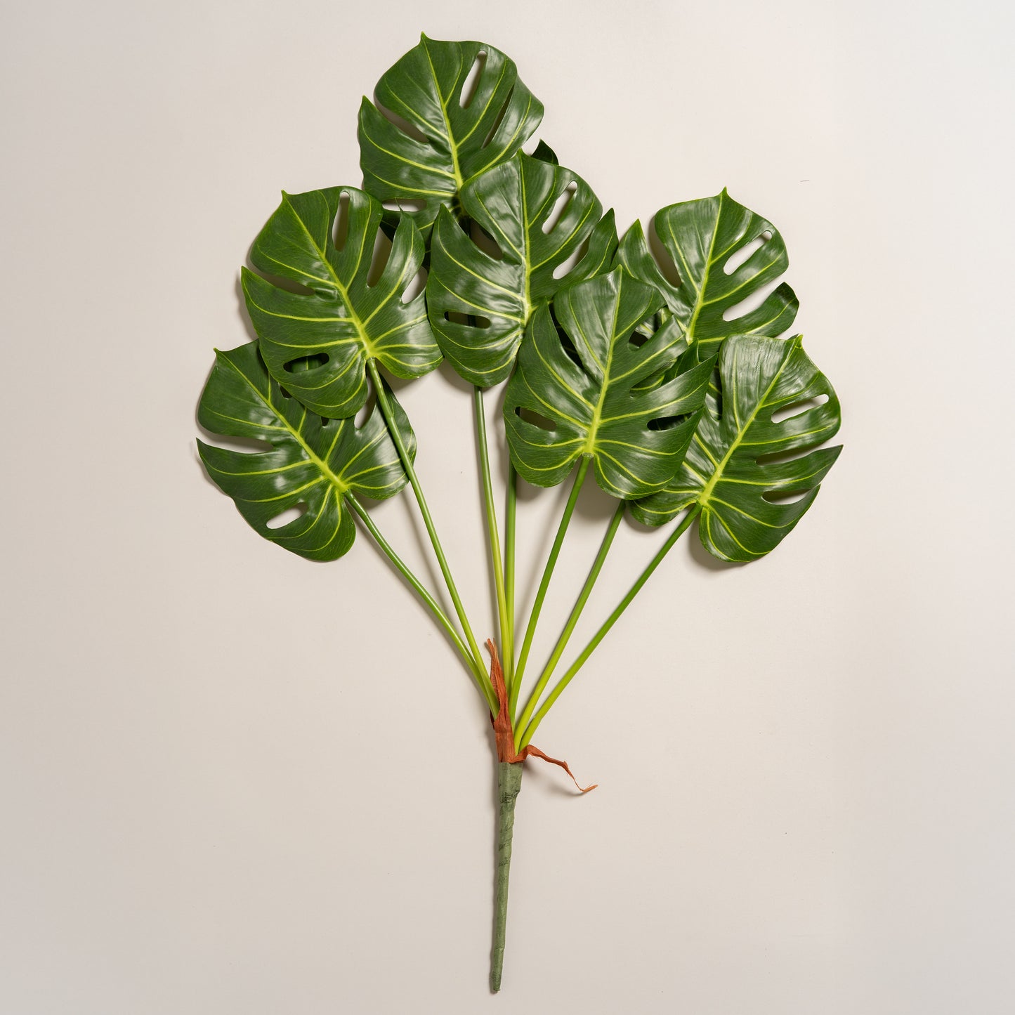 Planta artificial monstera con 7 hojas unidas 22 cm